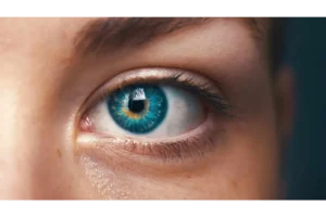 Close up of a persons blue left eye