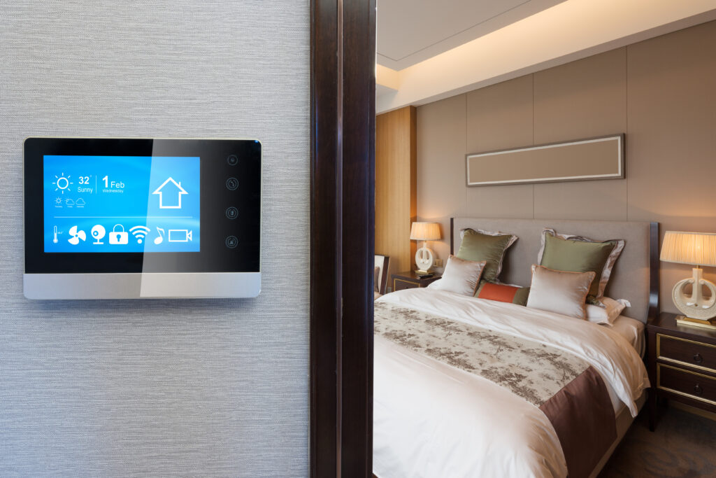 smart home system haning on a wall in a bedroom