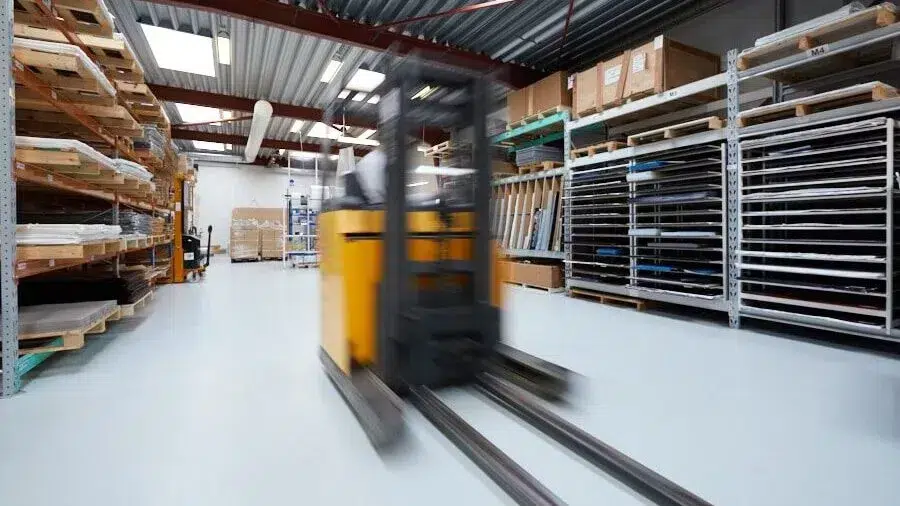 Yellow forklift in motion