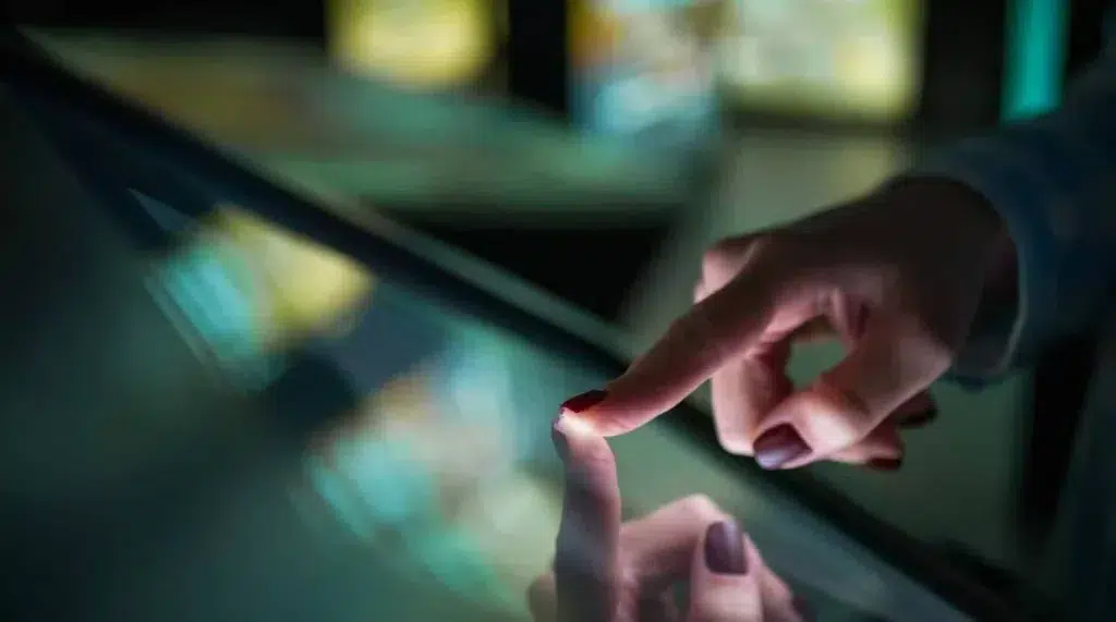 Person touching a touch screen